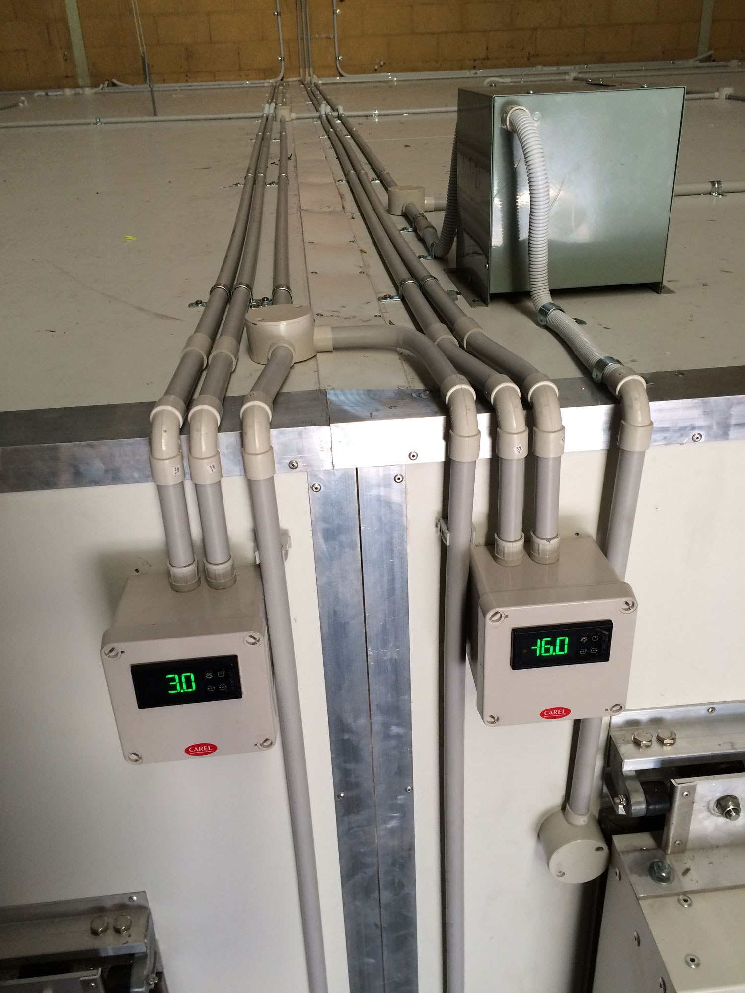 commercial refrigeration unit with temperature gauges