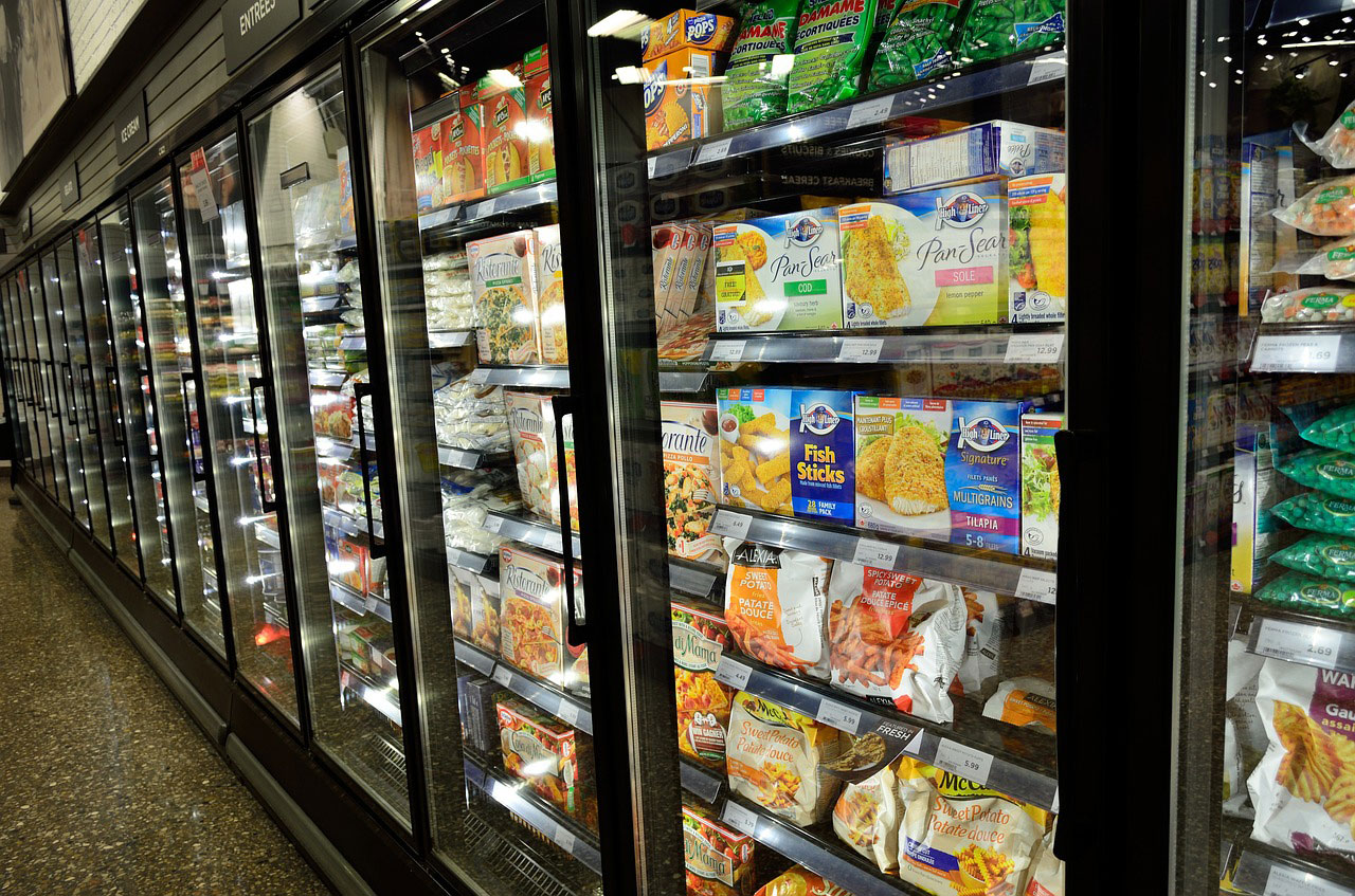 Supermarket fridges full of food