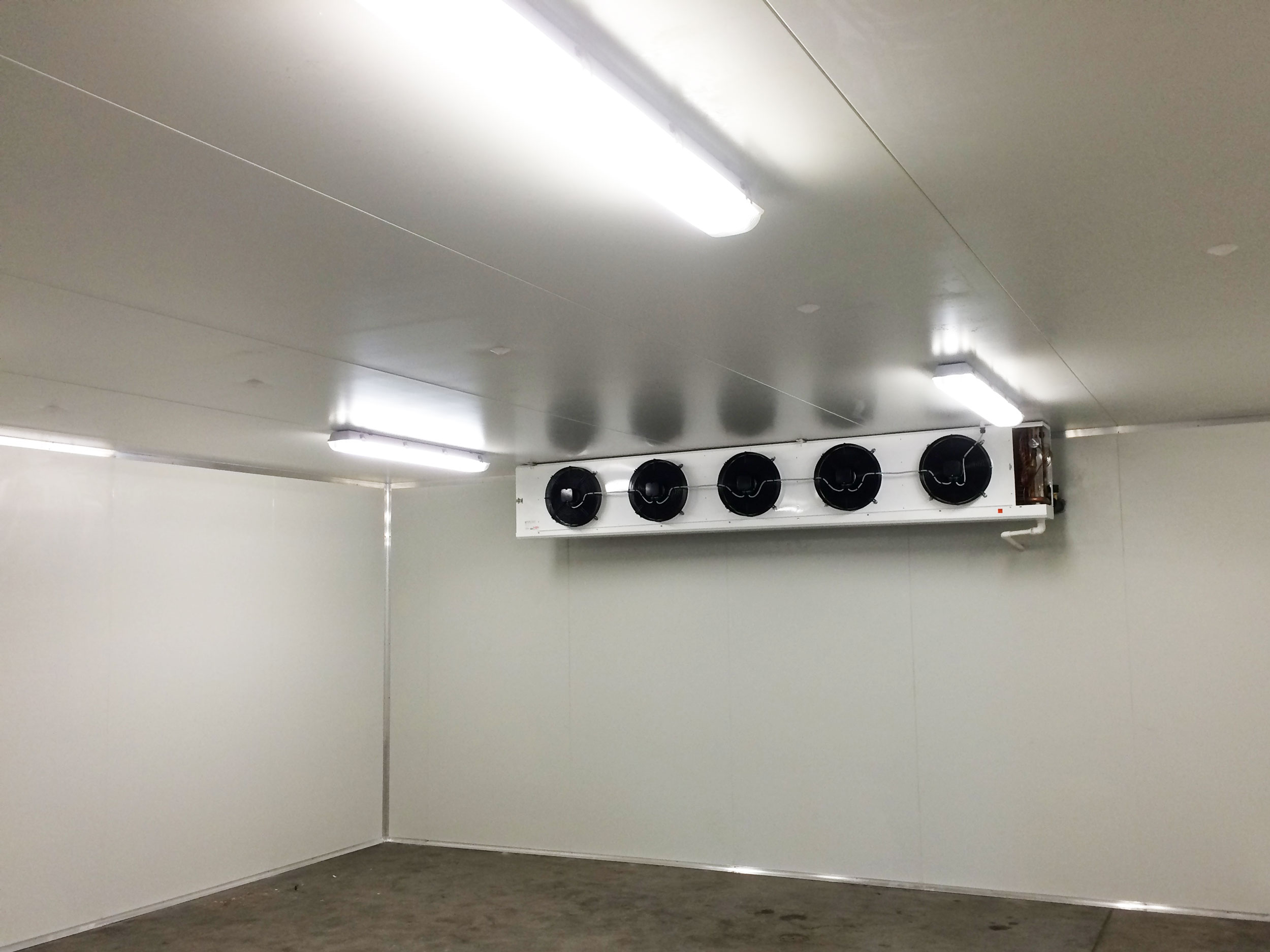 inside a commercial air conditioning unit with fans